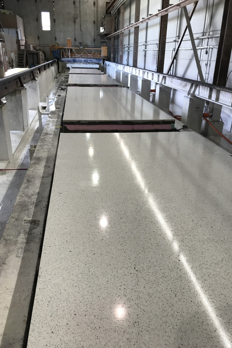 Smooth precast wall panel surface finish