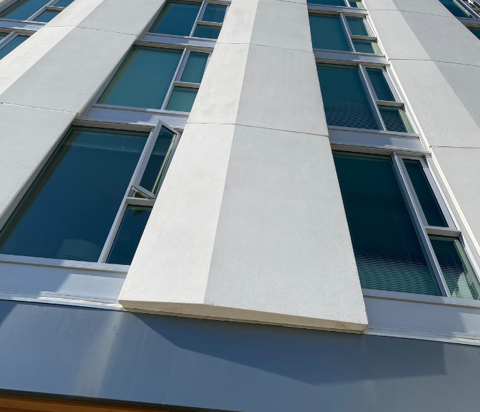 Modern building facade showcasing architectural precast concrete panels by APS Precast.